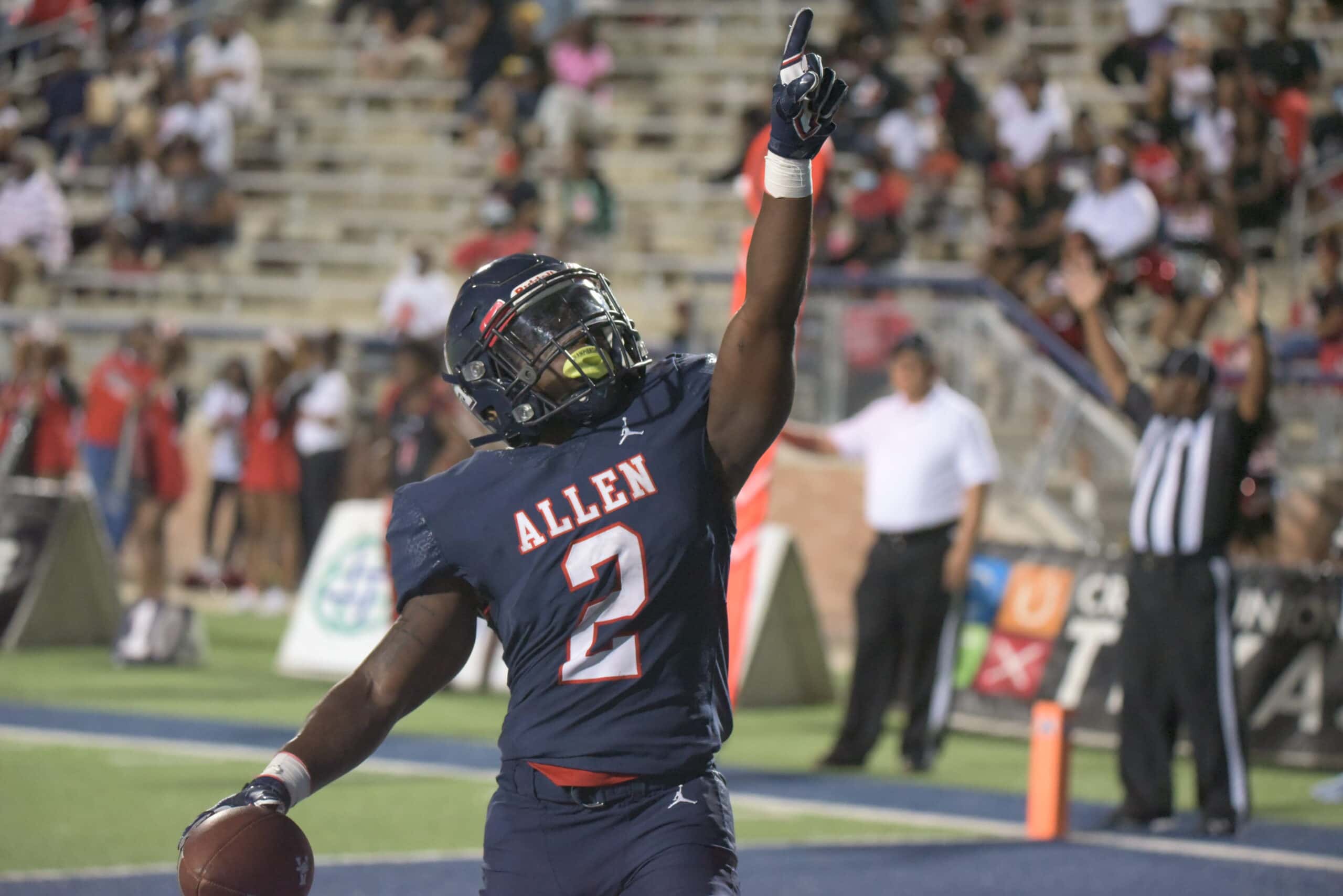 Allen running back celebrates