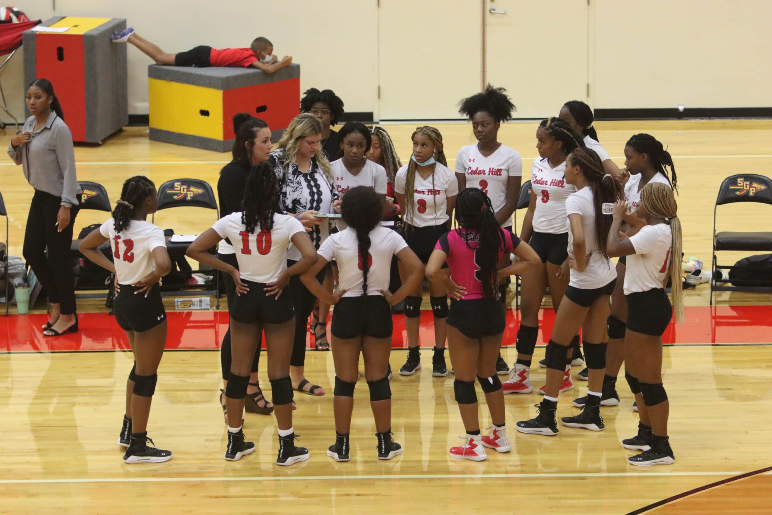 Cedar Hill volleyball team on sideline