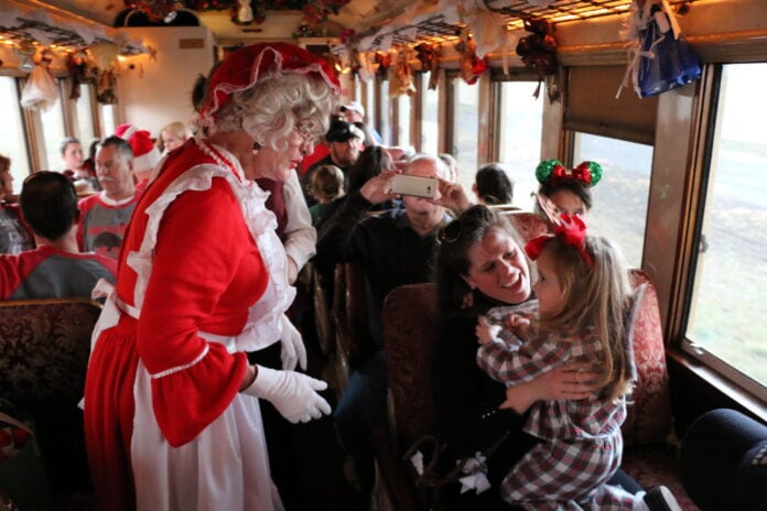 Mrs Claus greets children