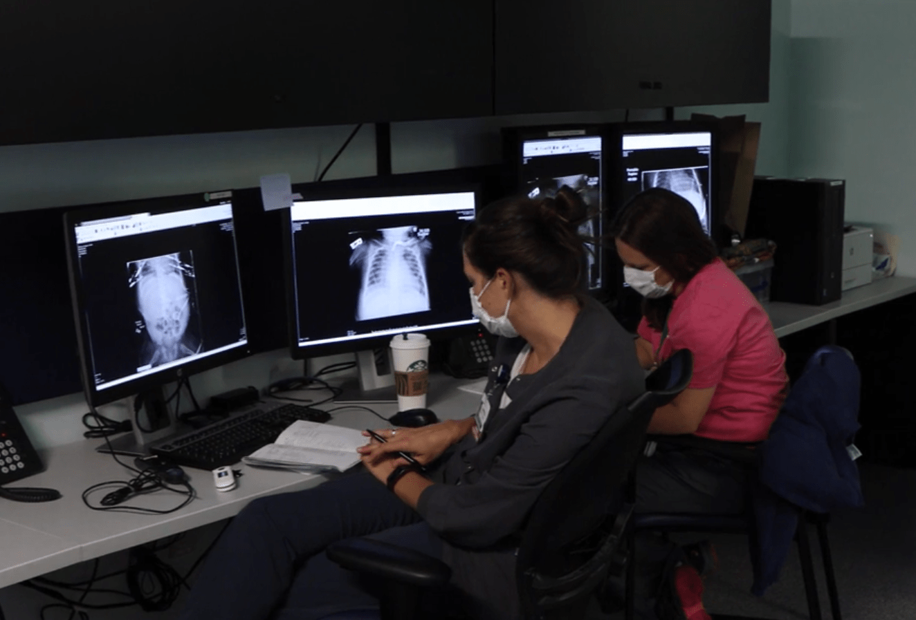 nurses looking at xrays