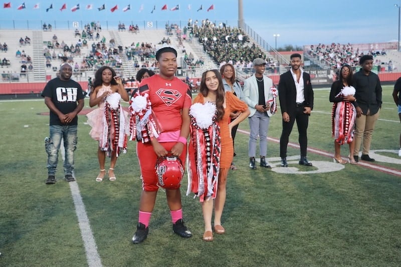 Cedar Hill football player with hoco queen