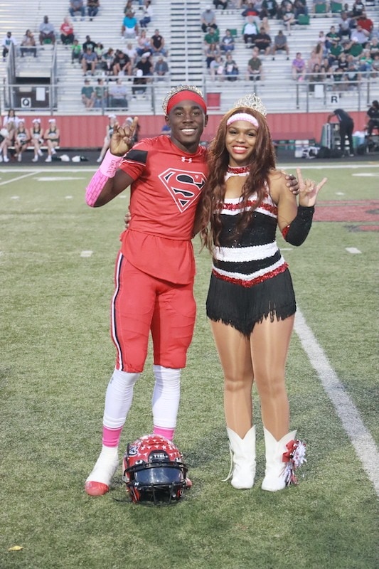 Ch football player with cheerleader