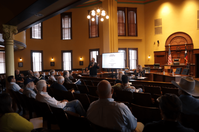 people in meeting at courthouse