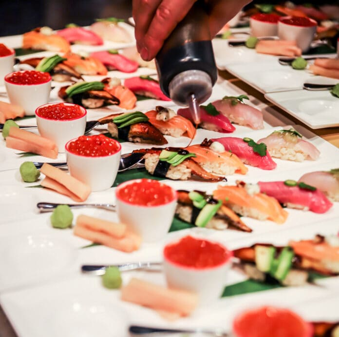 salmon sushi on plates