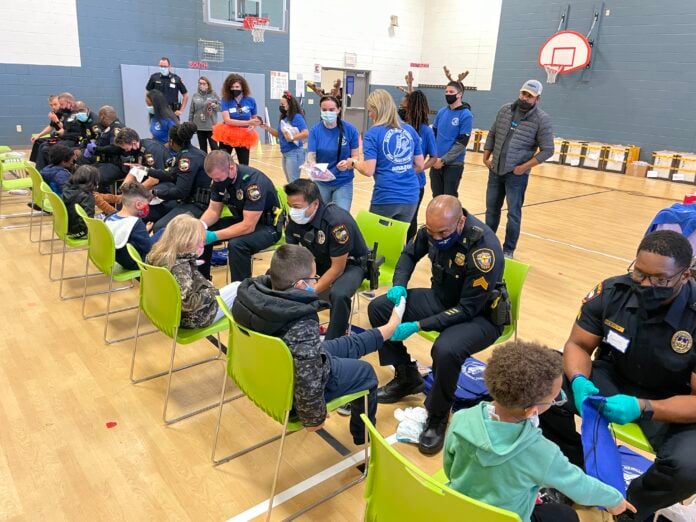 Police Officers with children