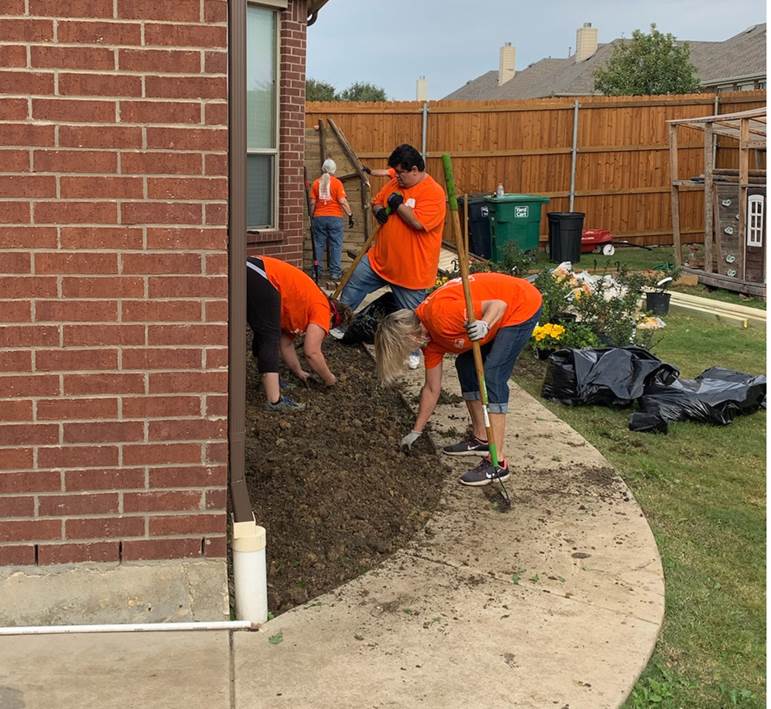 people doing yard work