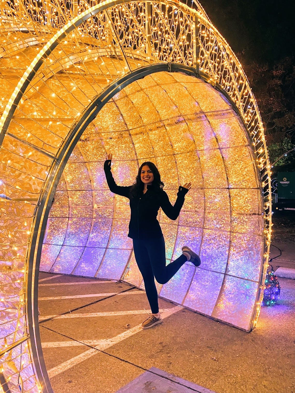 girl under lighted tunnel