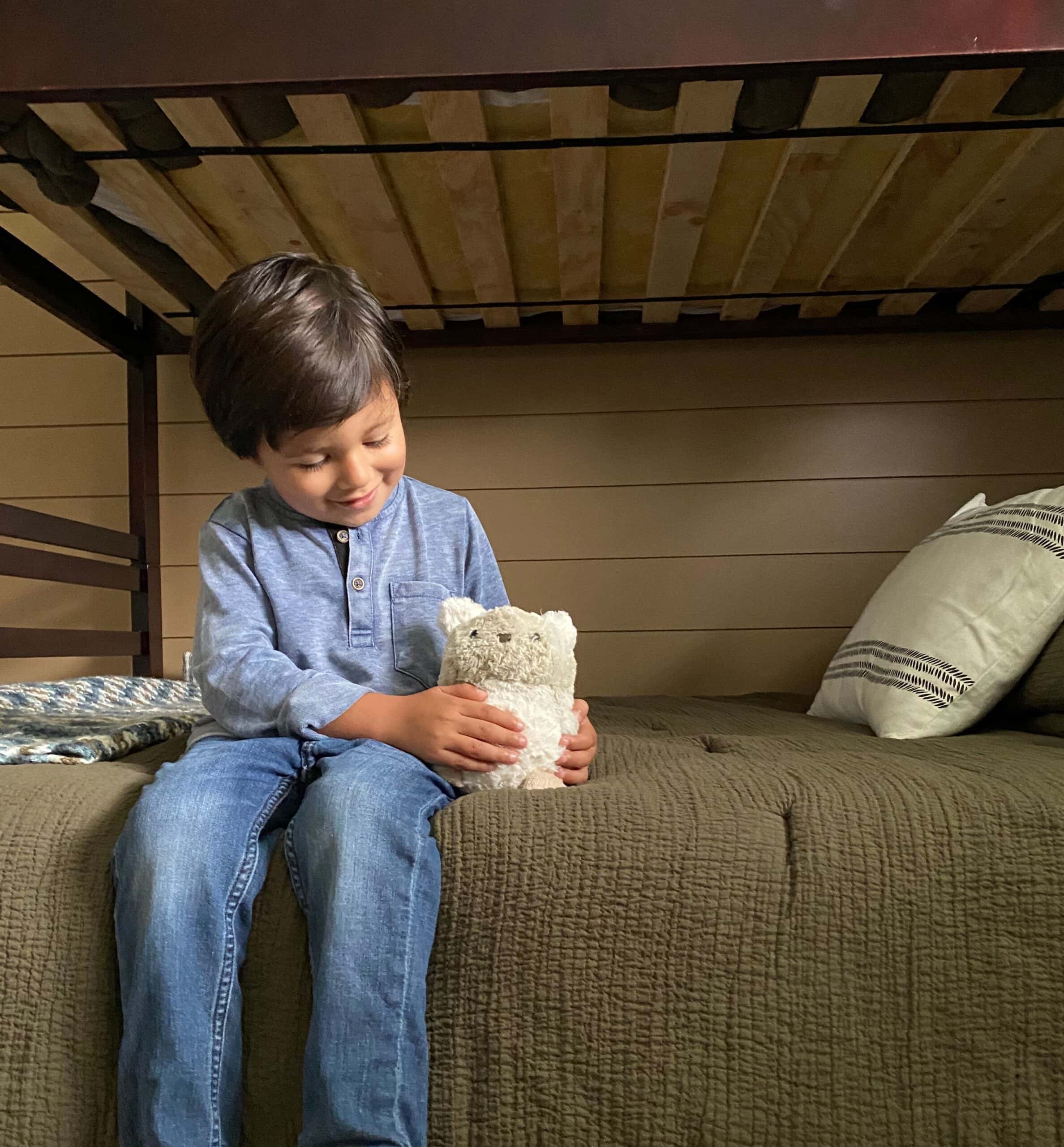 boy holding toy