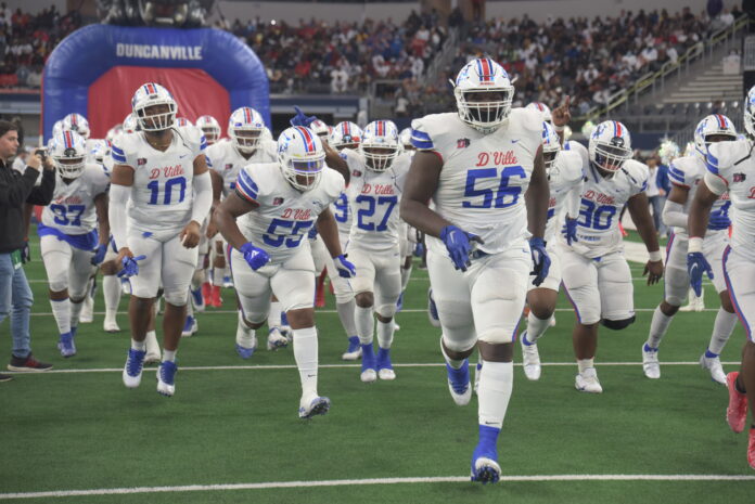 Duncanville players run onto field