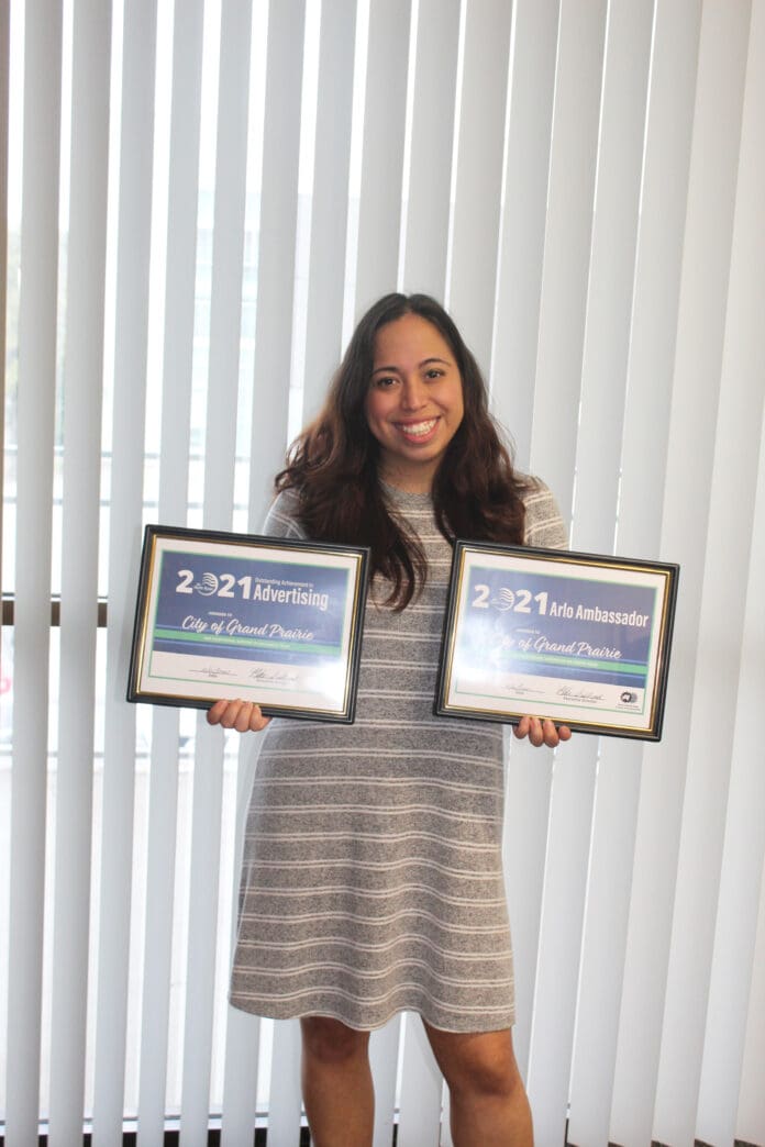 lady holding awards