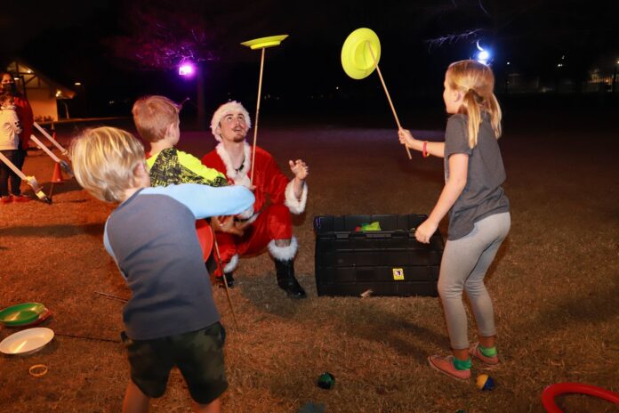 kids playing with Santa