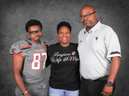 Cedar Hill Coach Lynn with wife and son