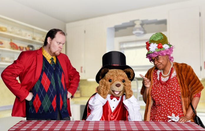 Man and woman with Paddington Bear