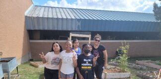 Permenter, Bray Earn “Seed Money” With Cedar Hill Green Award Grants kids in front of school garden