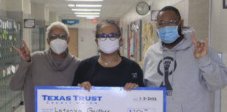 CHISD Teacher Gaither Honored as Texas Trust Trusted Hero three adults with Texas Trust check