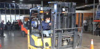 Cedar Hill Welding Scholars Earn Forklift Operator Certifications student on forklift