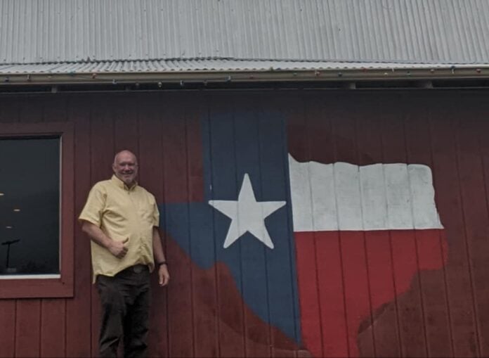 John Meager in front of Bubba's