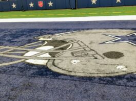 dallas cowboy helmet painted on field