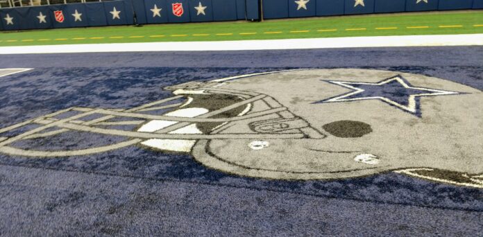 dallas cowboy helmet painted on field