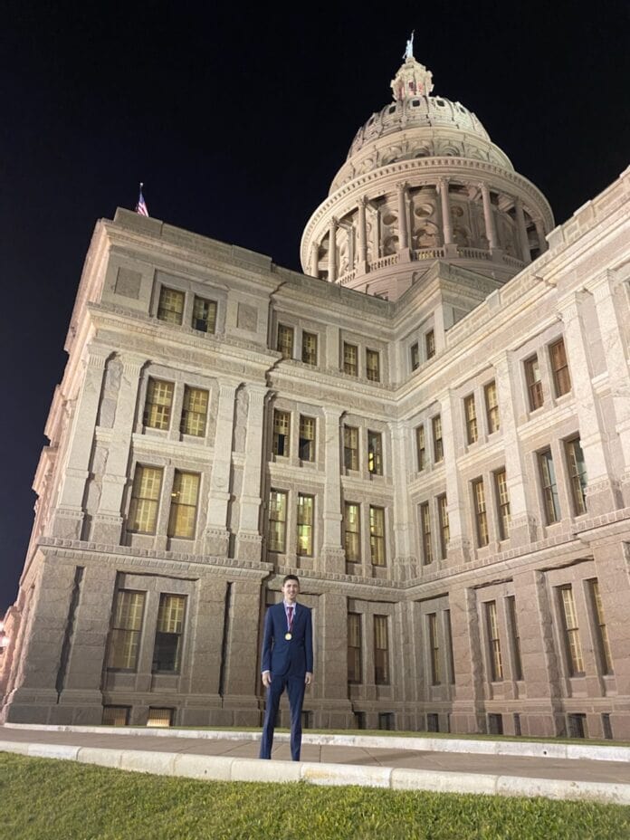 young man in front of building