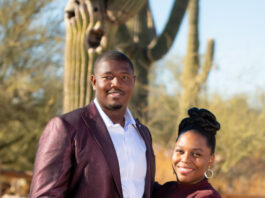 couple outside in front of cactus
