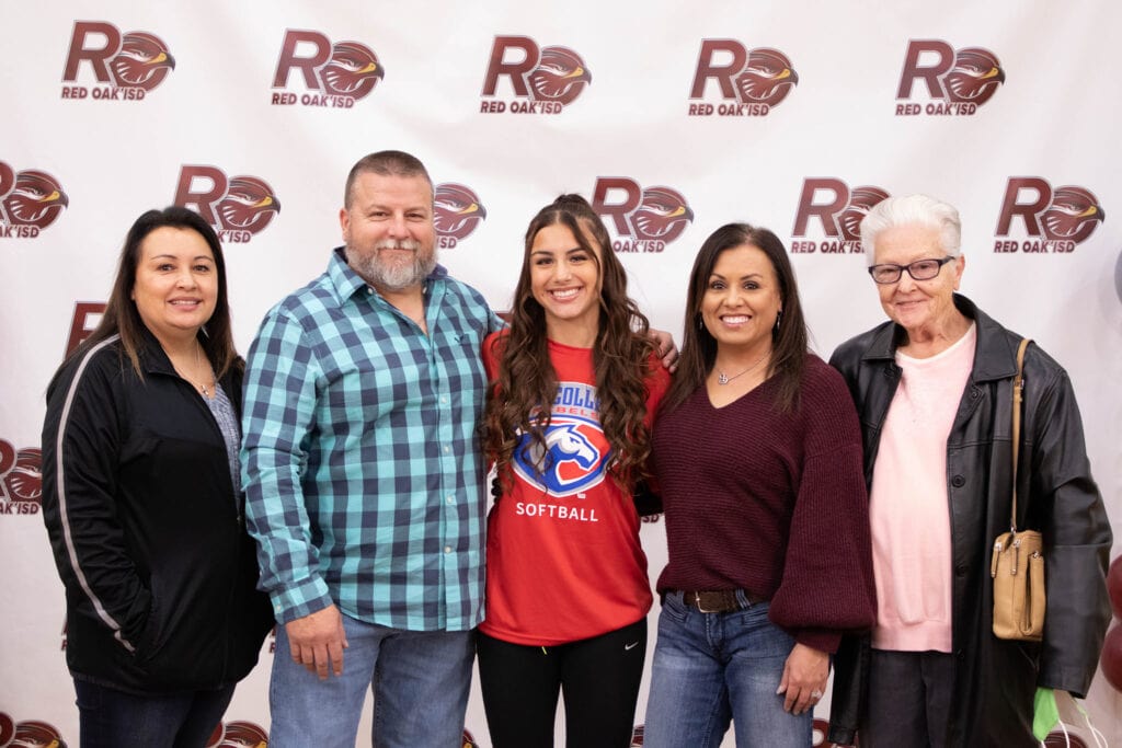 Tori Fowler with family on signing day