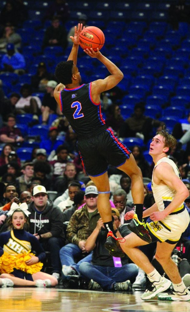 Evan Phelps shooting a basketball