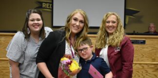 ROISD Bestowed the First ‘Maroon Star Award’ For Heroic Achievements three ladies with boy