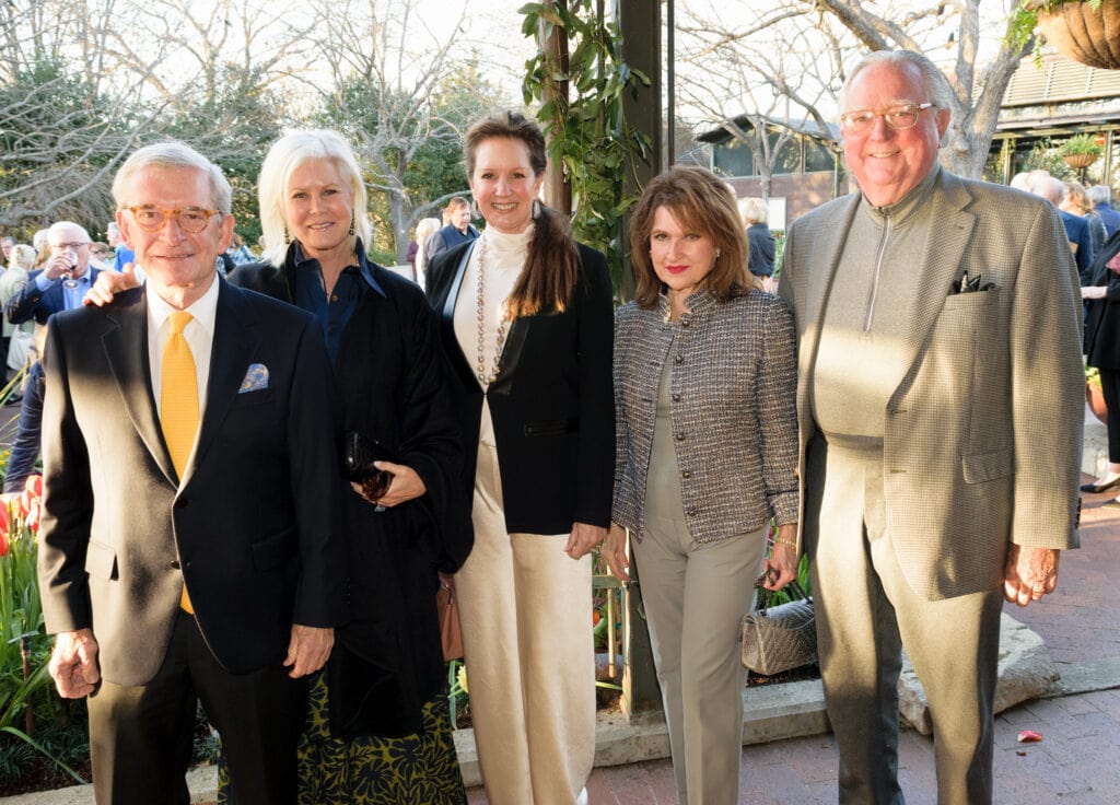 two men and three women standing together