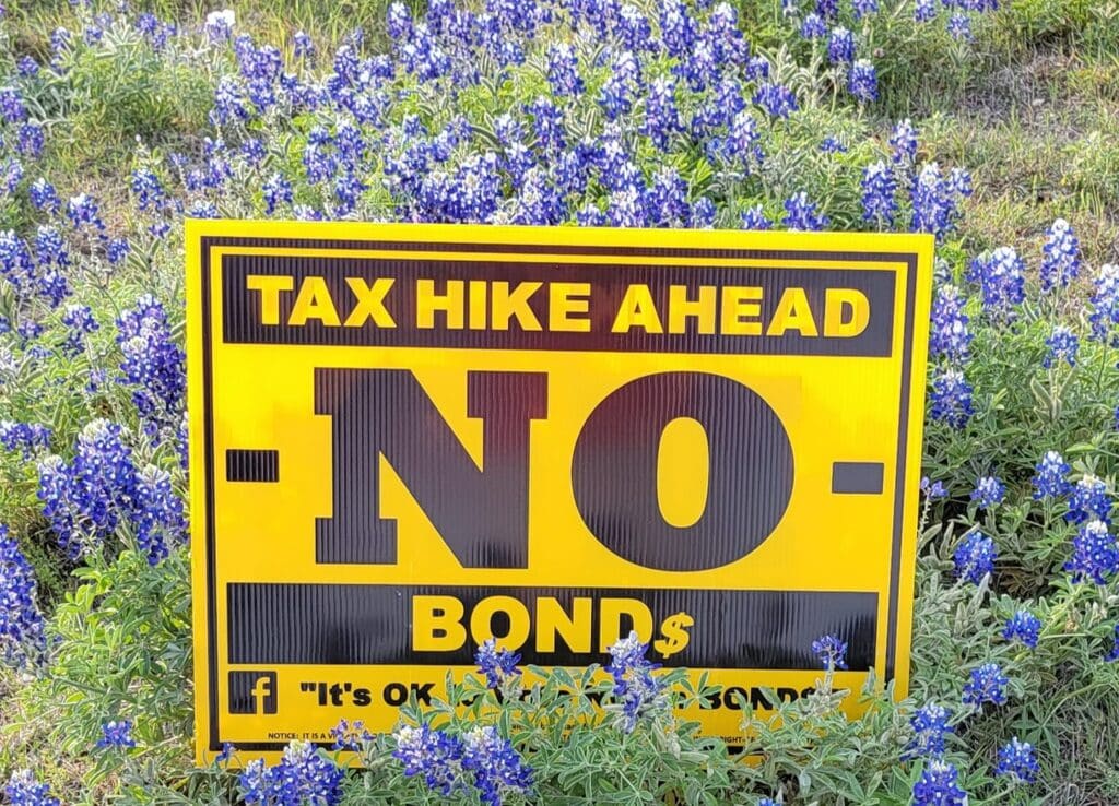 Tax hike no bonds sign