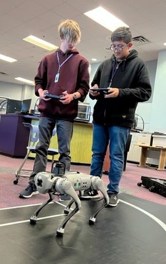 Student with robot dog