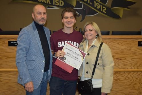 student and family Father son and Mom