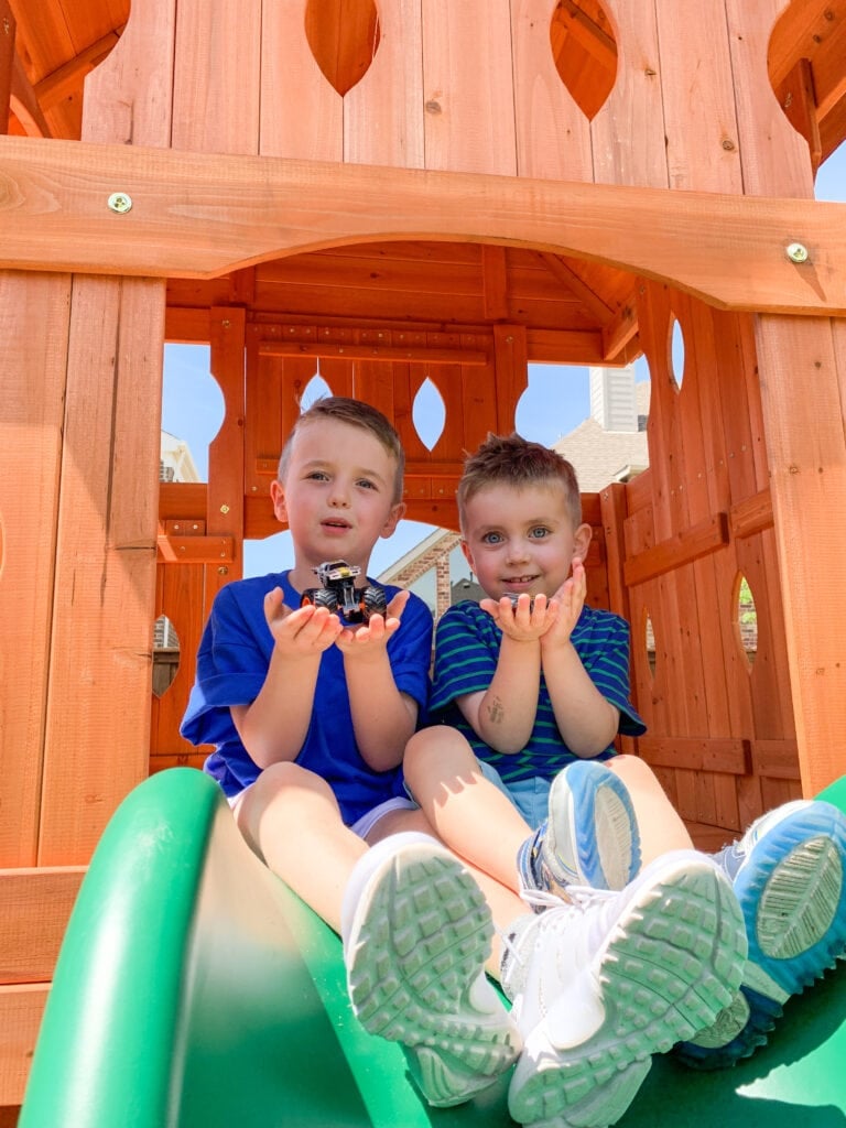 two boys on slide
