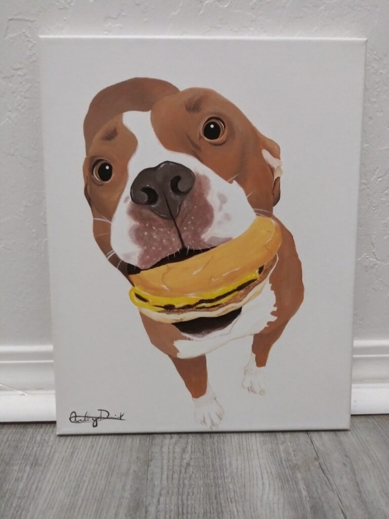 pitbull with cheesburger