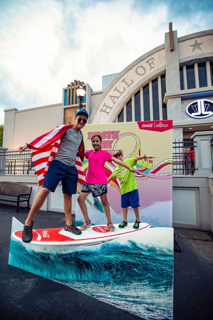 kids pose with 4th of July photo background