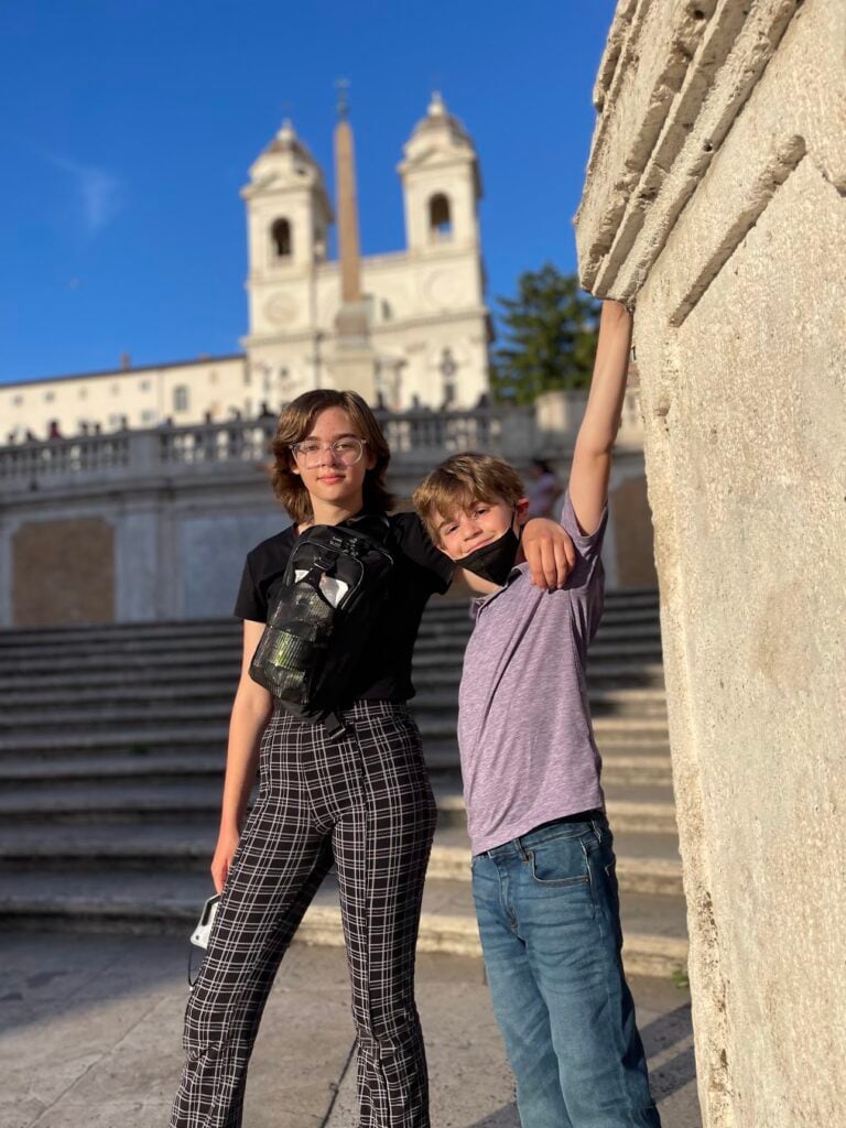 boy and girl on Spanish Steps in Rome