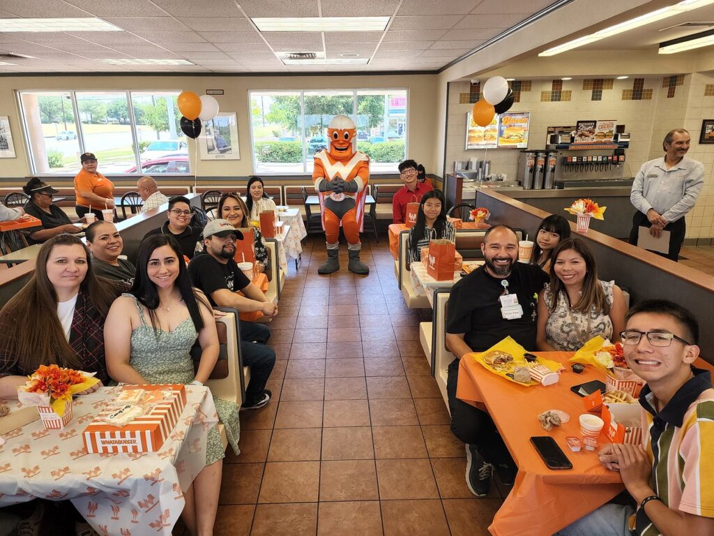 students in booths at Whataburger in San Antonio
