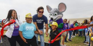 Carter’s Kids & Chuck E. Cheese Build Playground for Dallas School Carter's kids and Chuck E. Cheese build playground