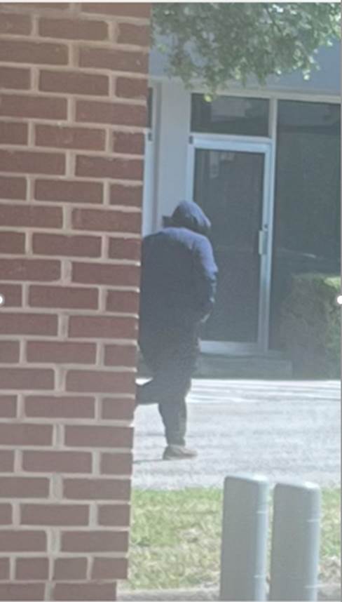 bank robber suspect in hoodie