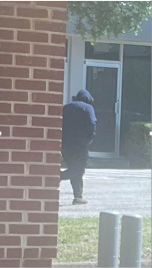 Hooded bank robber suspect