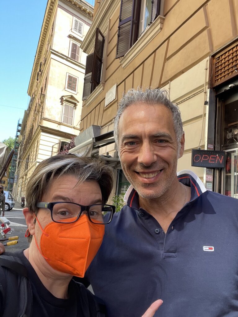 Woman wearing bright orange KN95 mask