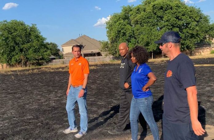 DeSoto Fire Chief Bryan Southard (far right) walks DeSoto Officials (from left to right) City Manager Brandon