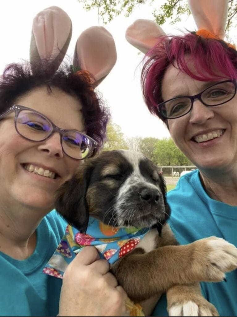 Two ladies with a puppy