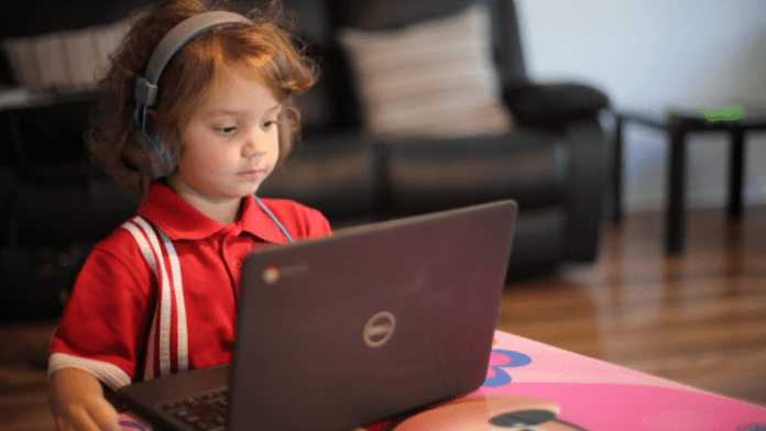 kid with laptop