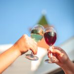 Tickets for 36th Annual GrapeFest Available Now two wine glasses clinking
