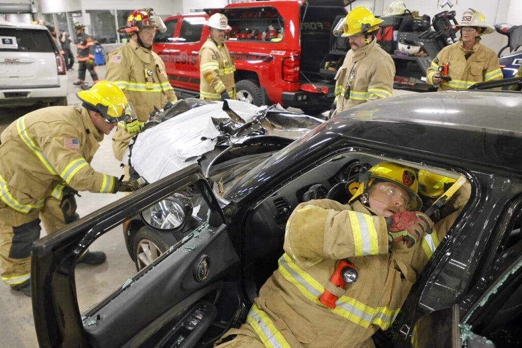 firefighters inside the car