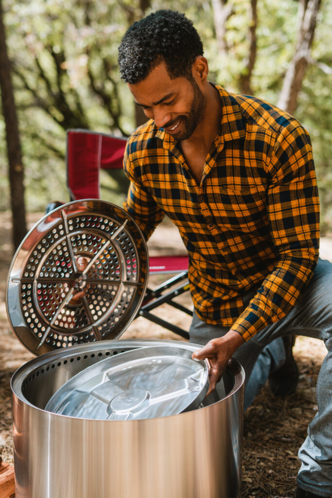 guy with firepit parts