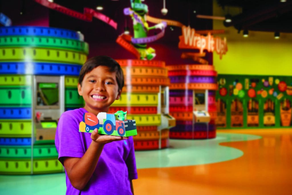 kid holding Crayola craft