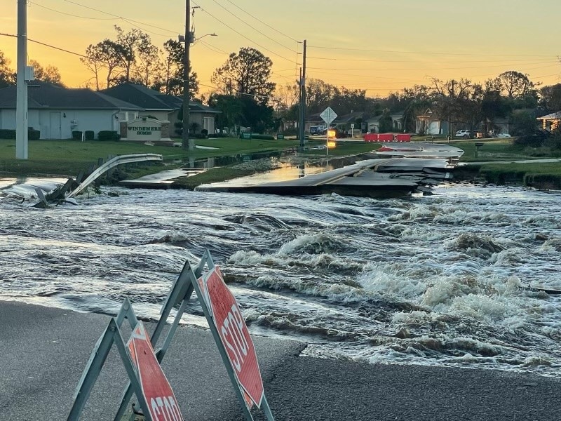 water over road in north port