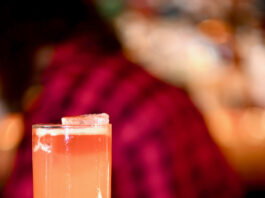 pink drink in highball glass